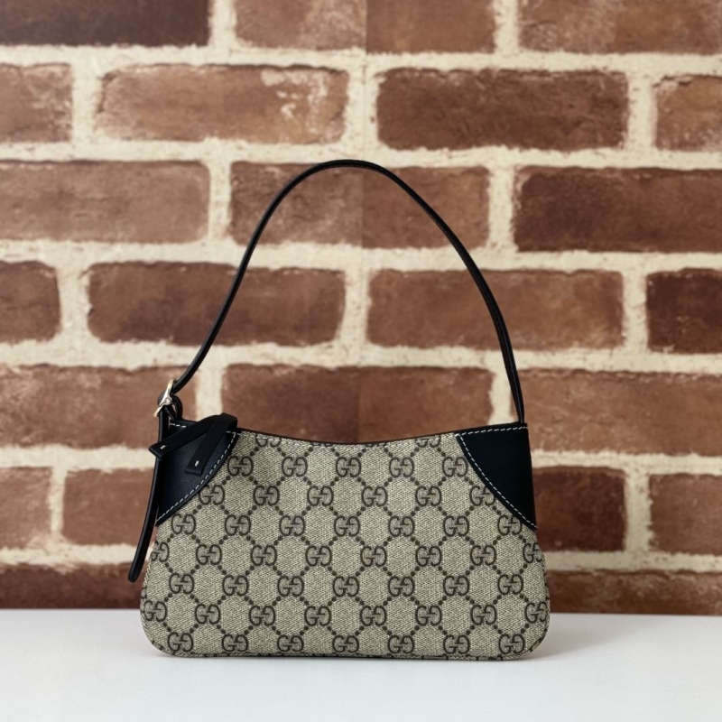 G*u*i top handle bags